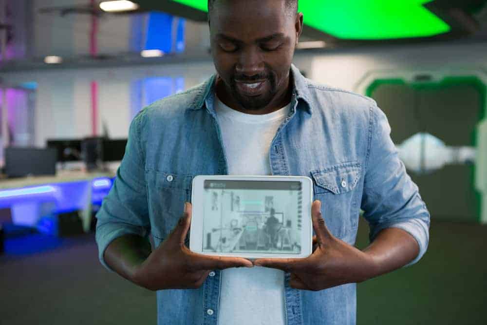 Man holding tablet for Mobile first website